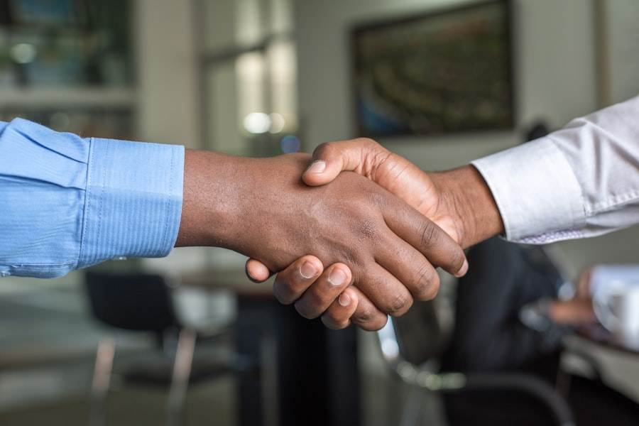 Client meeting concluding with a handshake