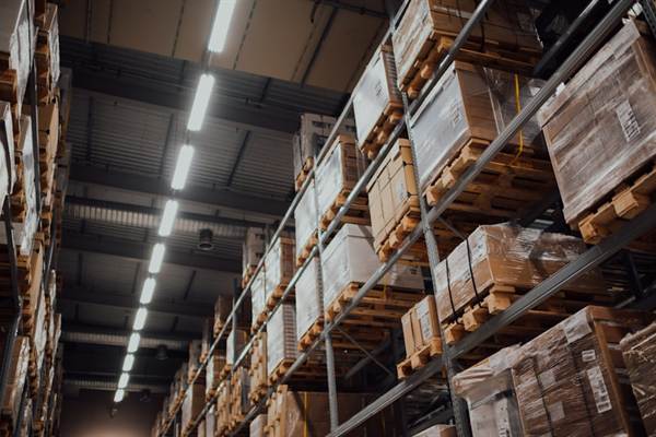 Warehouse racking stacked with palletised goods